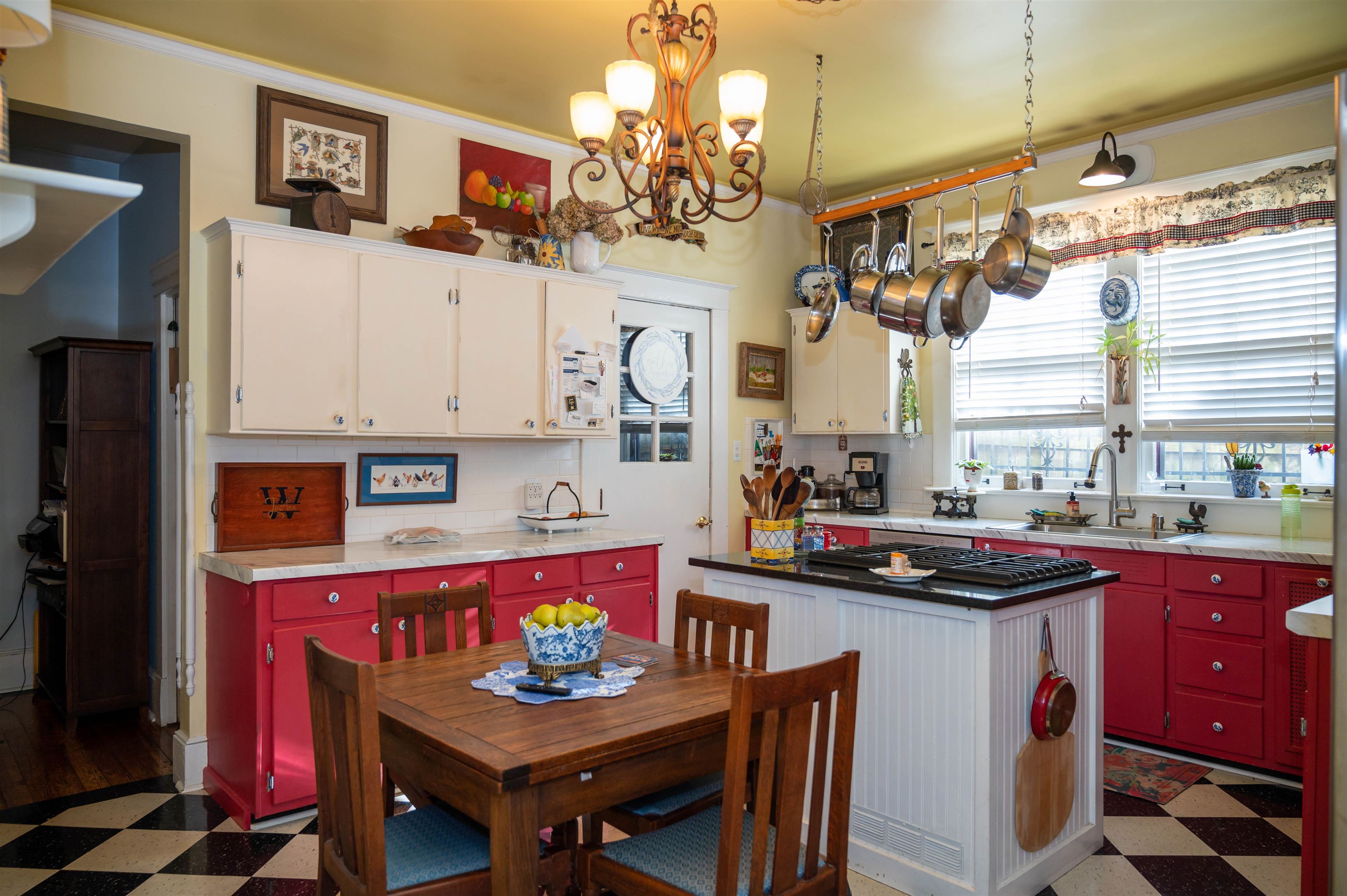 1267 Central Avenue Memphis, TN 38104 - Photo 8 of 25 a kitchen with stainless steel appliances granite countertop a sink stove and refrigerator