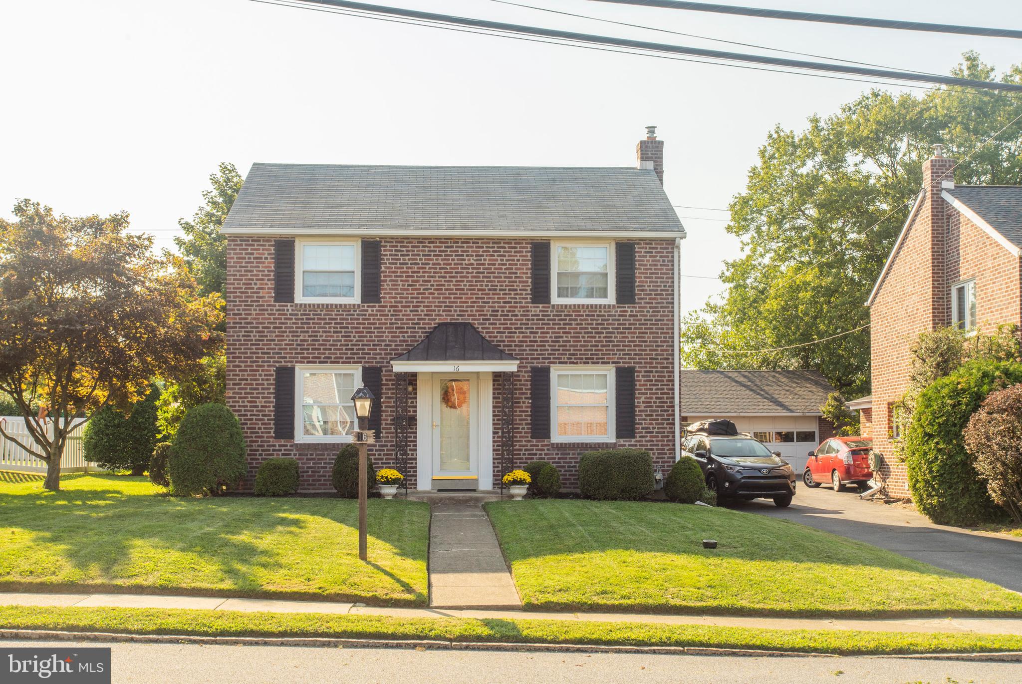 16 West Avenue Springfield, PA 19064 - Photo 2 of 34 a front view of a house with a yard
