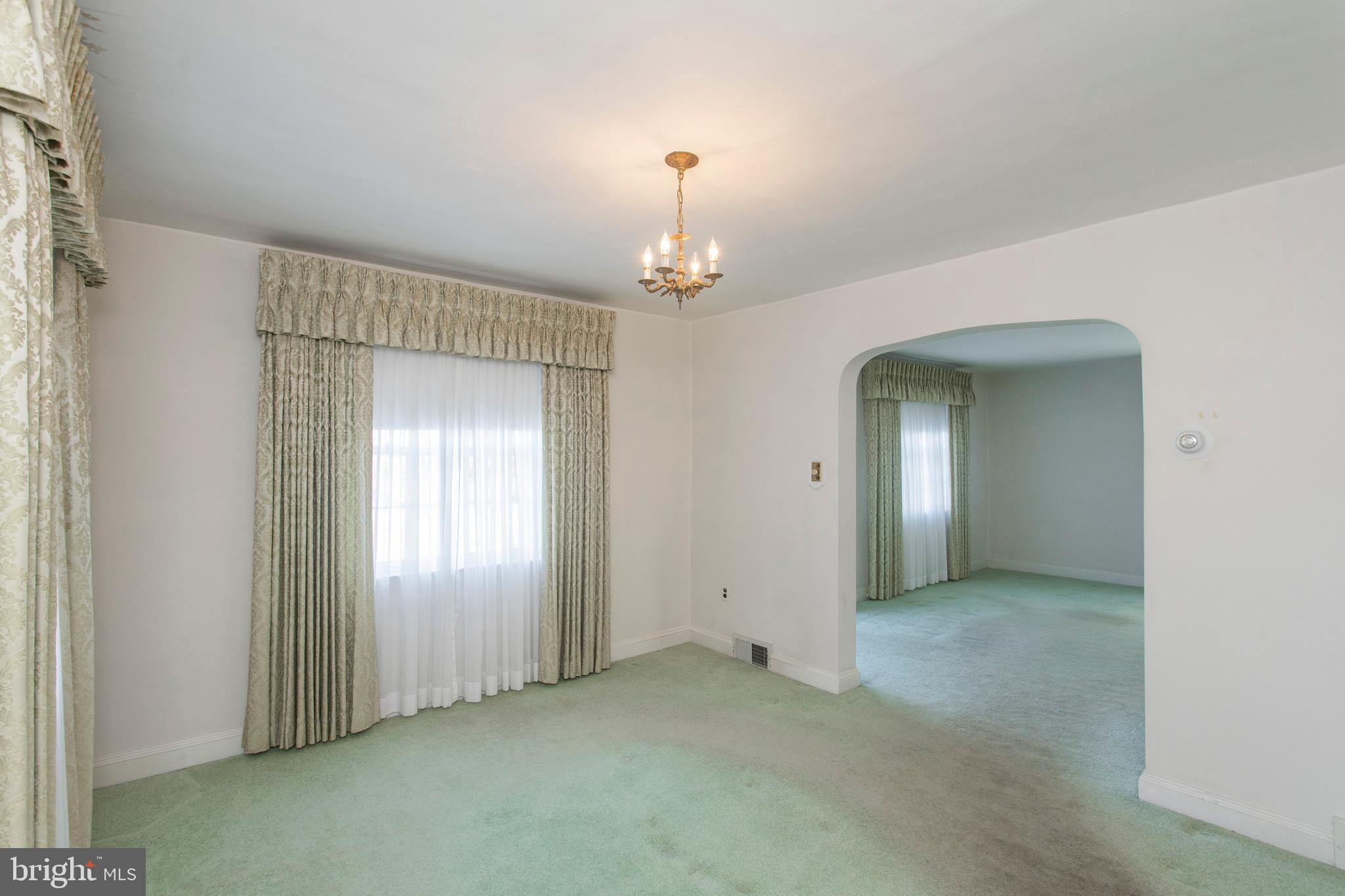 16 West Avenue Springfield, PA 19064 - Photo 16 of 34 an empty room that has a mirror in it