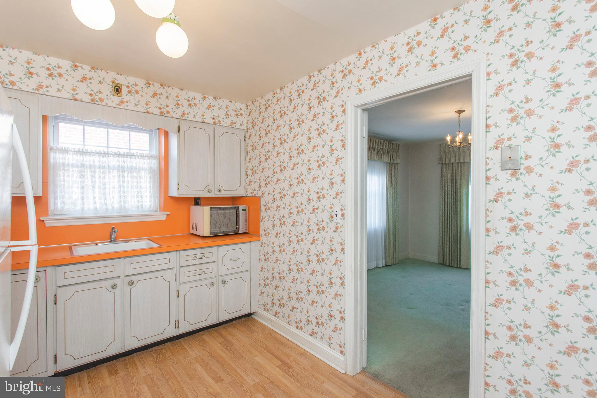 16 West Avenue Springfield, PA 19064 - Photo 19 of 34 a bathroom with a sink a mirror and a shower