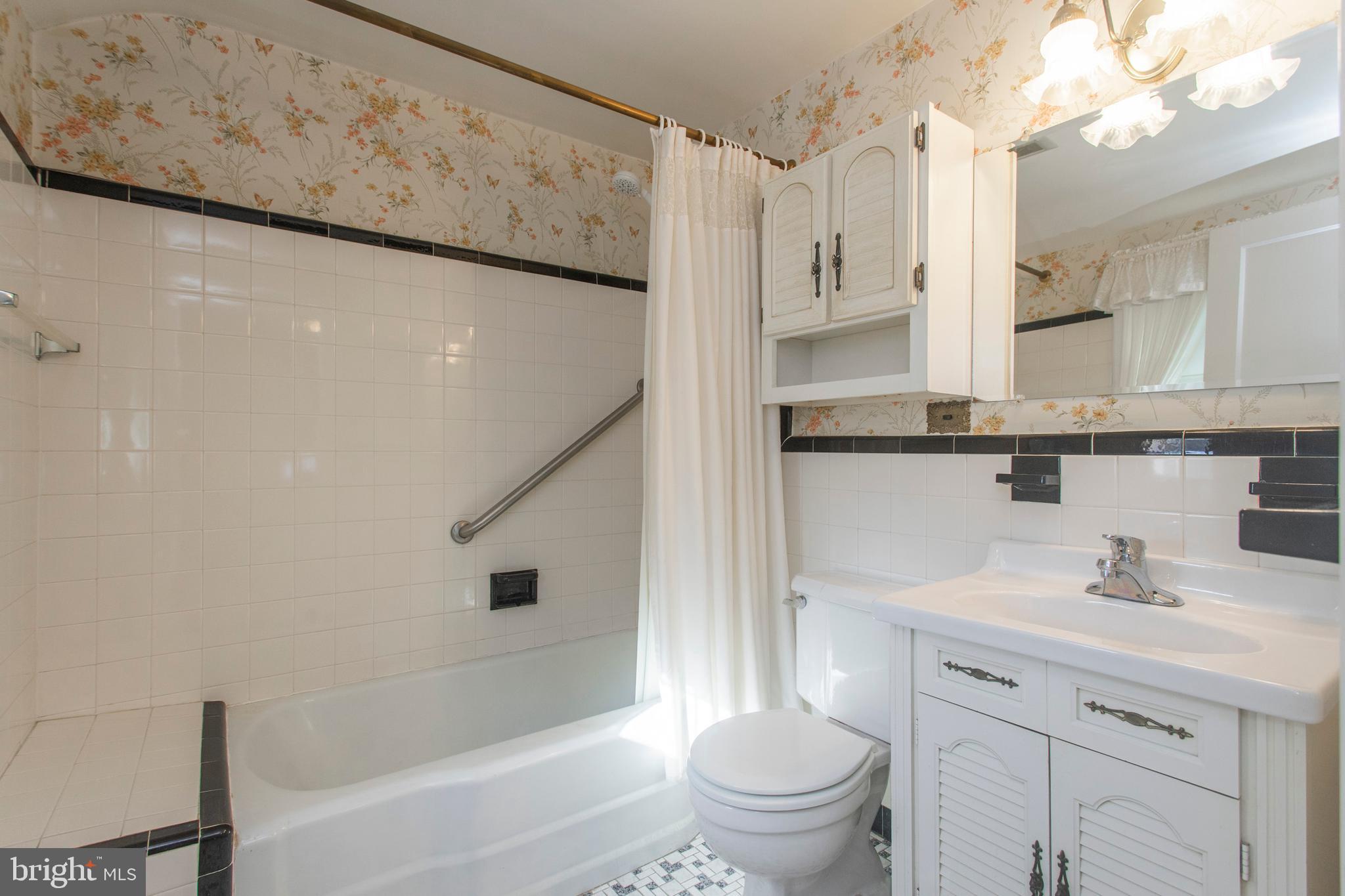 16 West Avenue Springfield, PA 19064 - Photo 22 of 34 a bathroom with a sink a toilet and bathtub