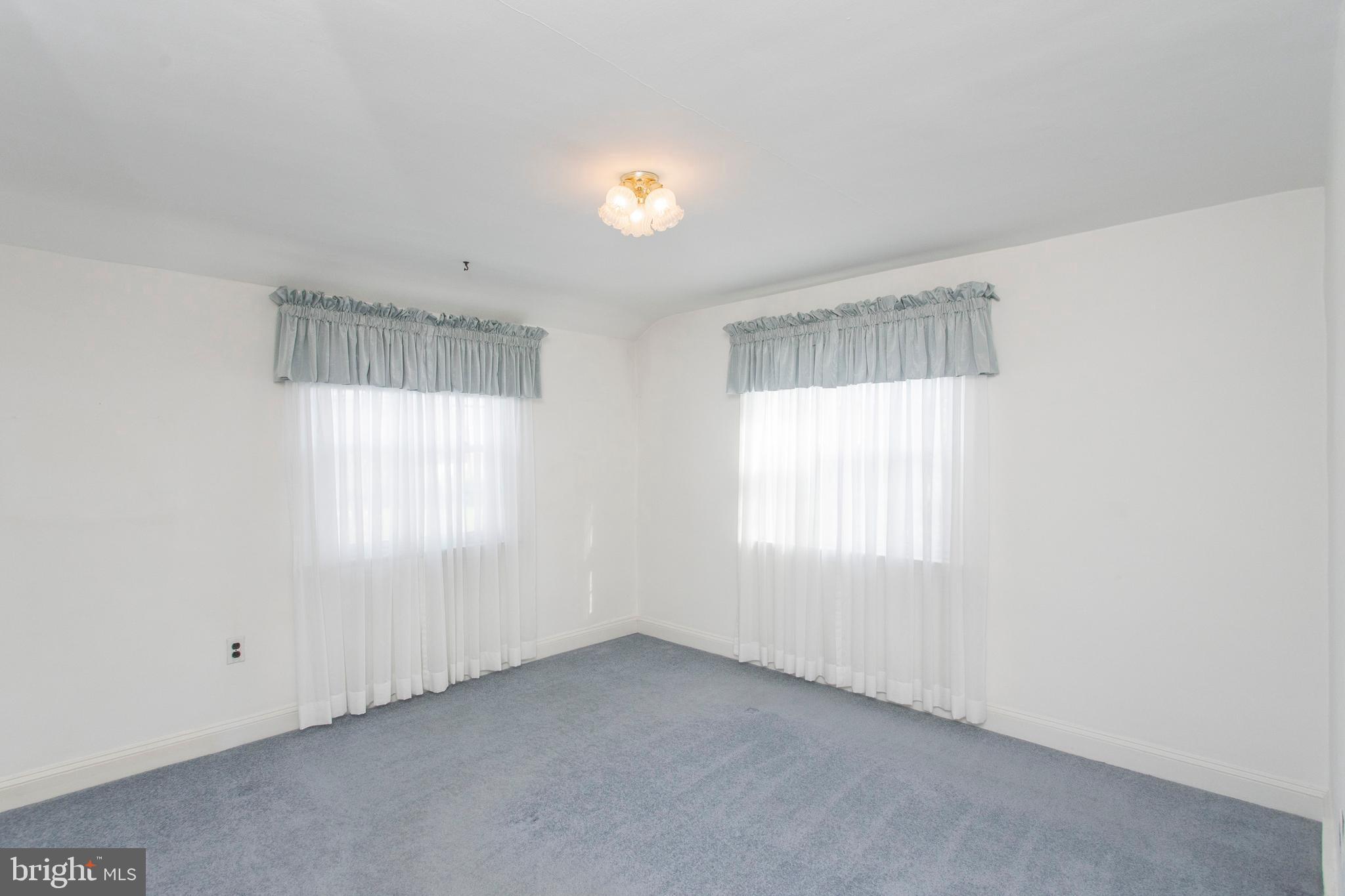 16 West Avenue Springfield, PA 19064 - Photo 26 of 34 a view of an empty room with a window