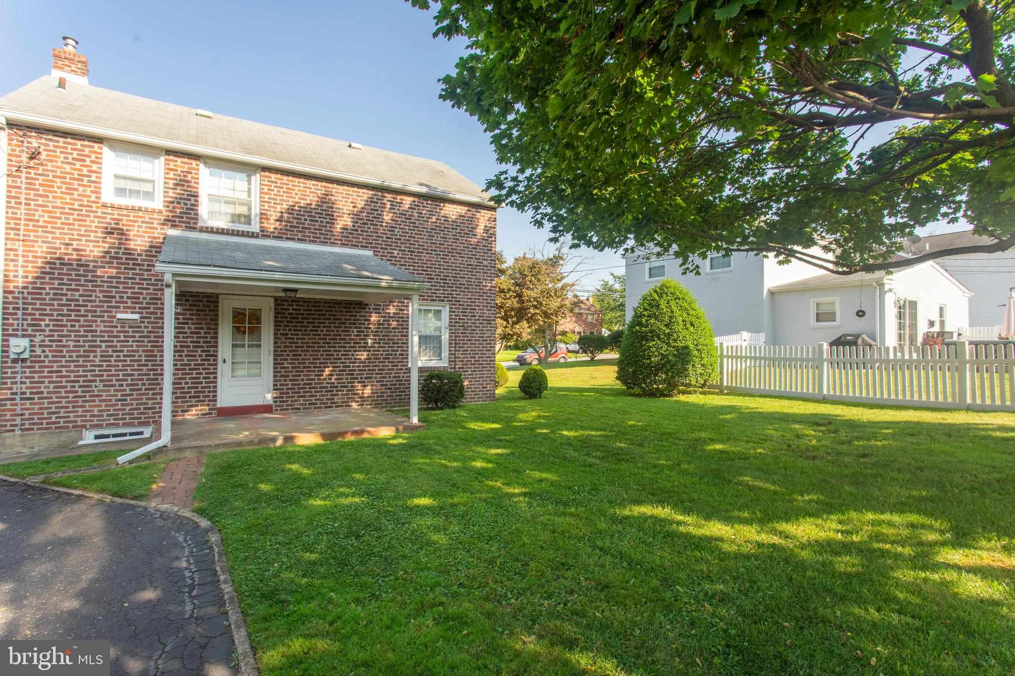 16 West Avenue Springfield, PA 19064 - Photo 4 of 34 a view of a house with a backyard