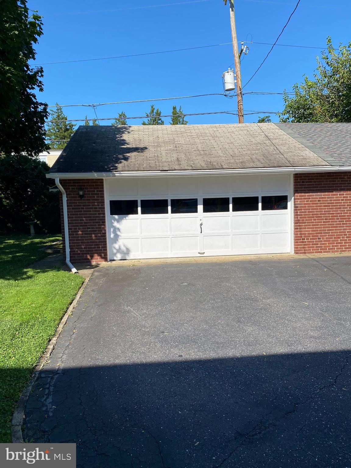 16 West Avenue Springfield, PA 19064 - Photo 6 of 34 a front view of a house with a yard