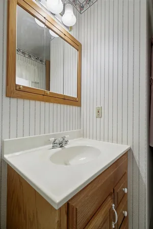 a sink with a mirror