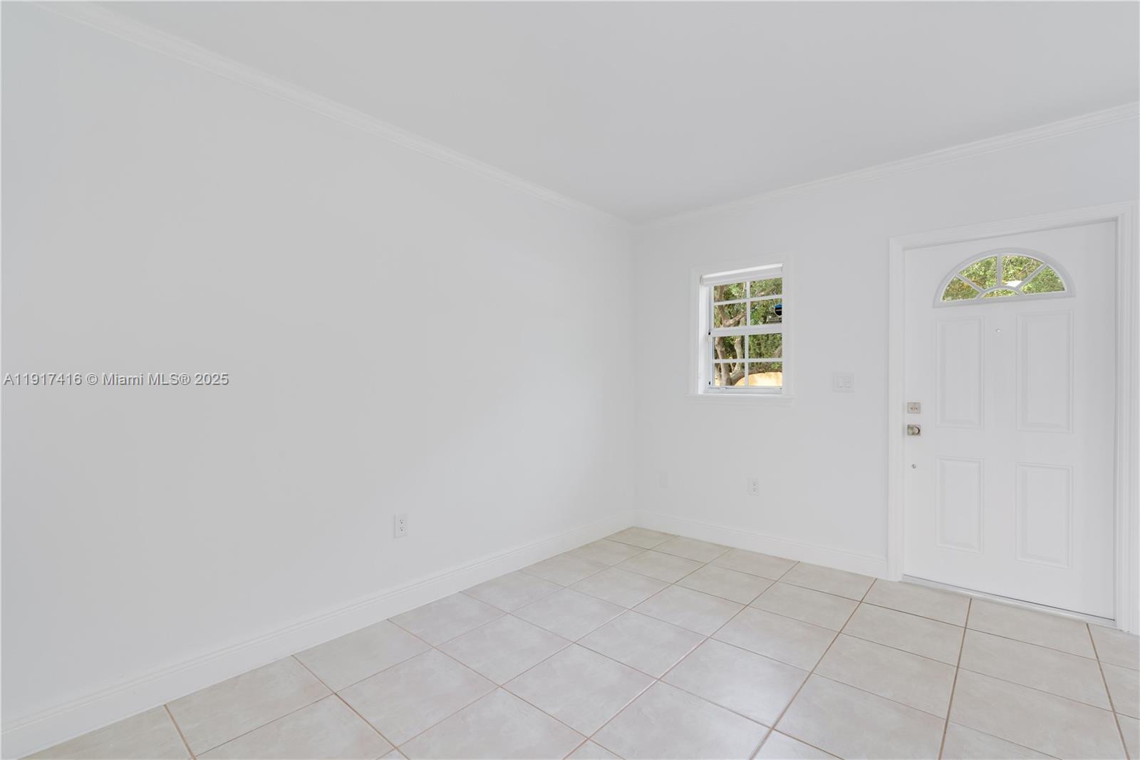 9481 Southwest 78th Avenue Miami, FL 33156 - Photo 16 of 45 a view of room with hardwood floor and window