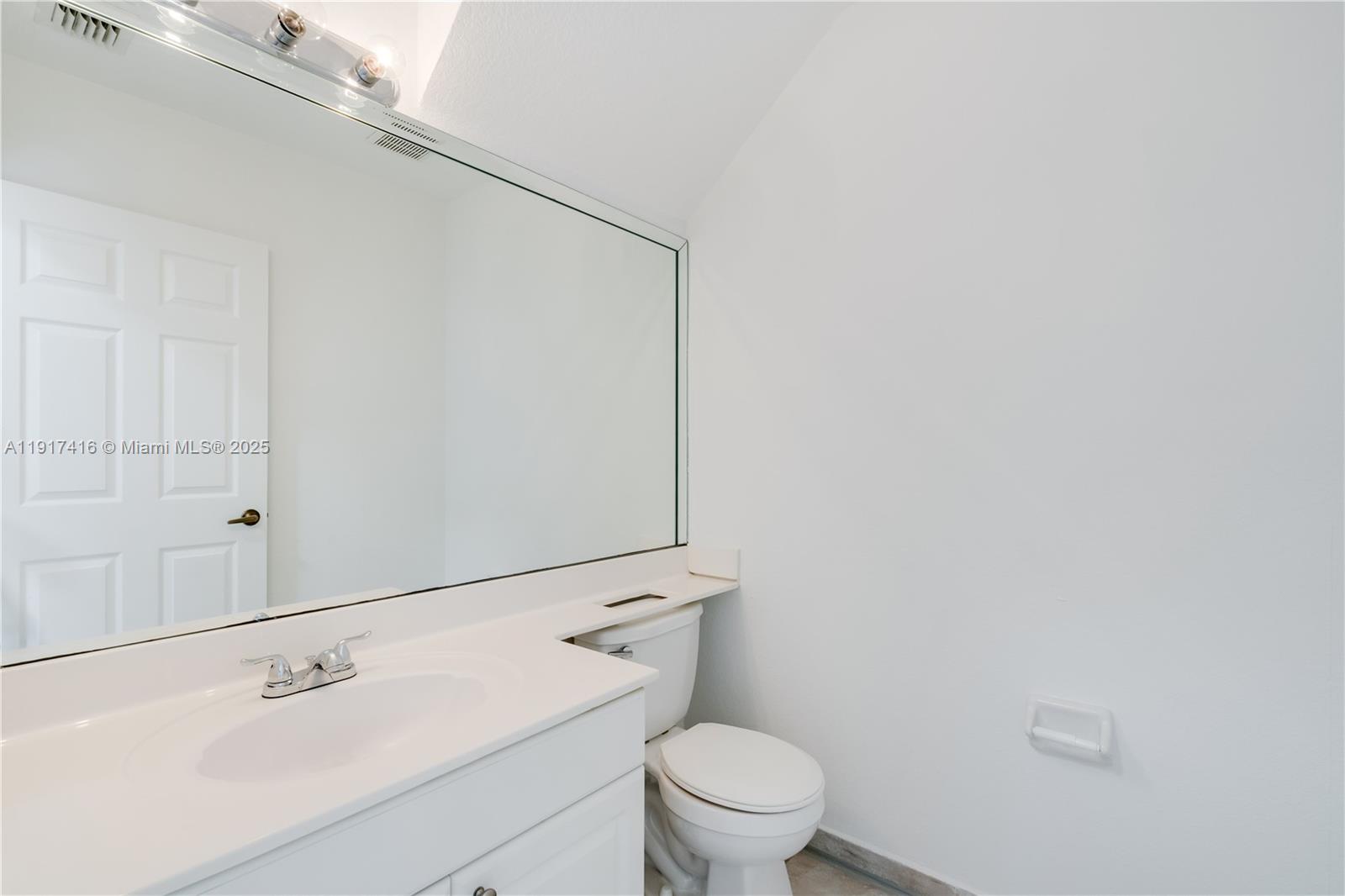 9481 Southwest 78th Avenue Miami, FL 33156 - Photo 17 of 45 a bathroom with a sink a toilet and shower