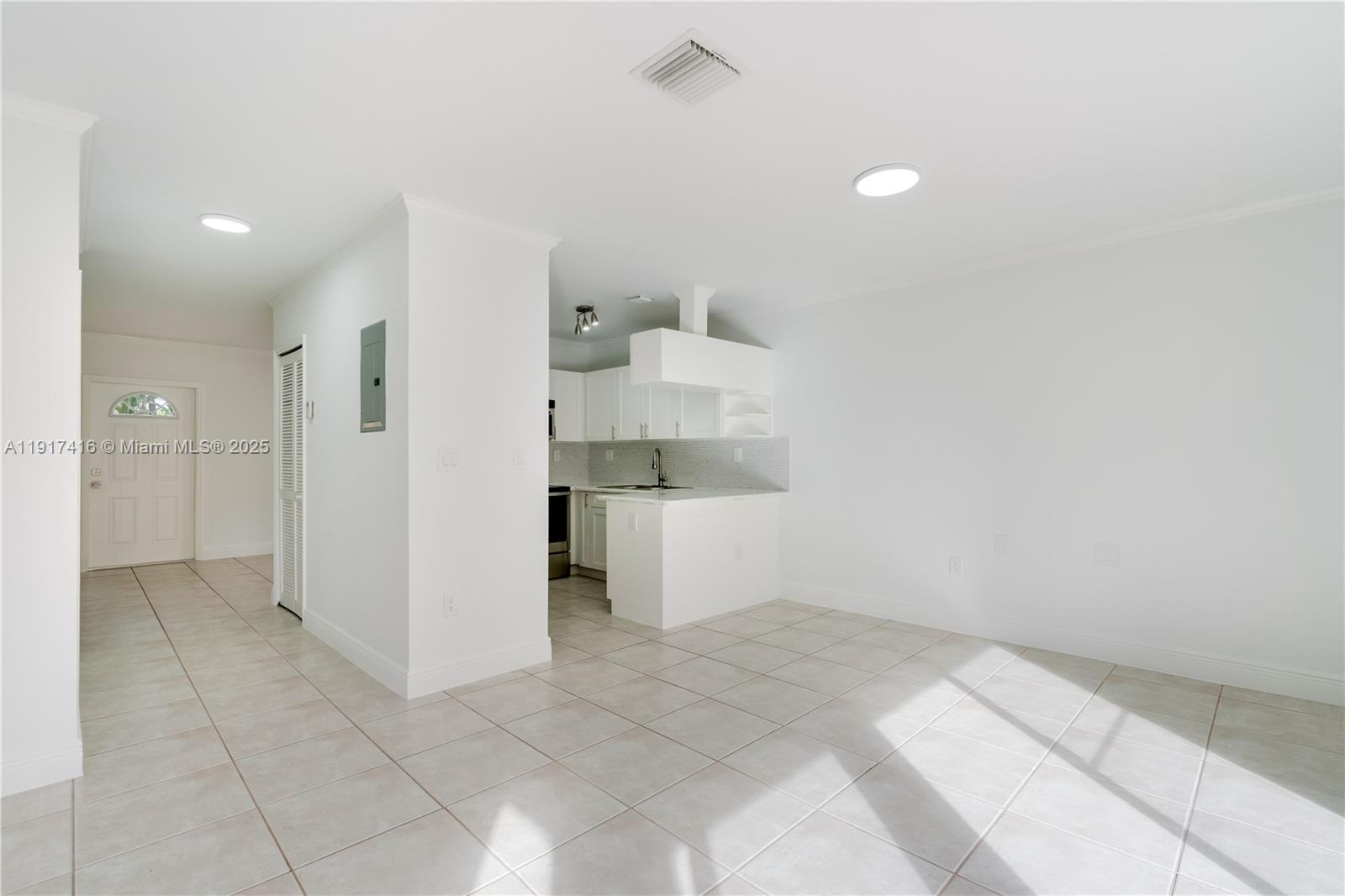 9481 Southwest 78th Avenue Miami, FL 33156 - Photo 18 of 45 a view of a room with a barbeque and entryway