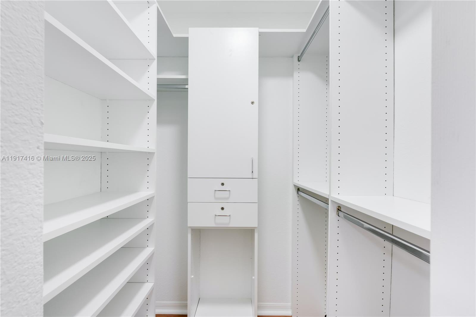 9481 Southwest 78th Avenue Miami, FL 33156 - Photo 27 of 45 a view of walk in closet