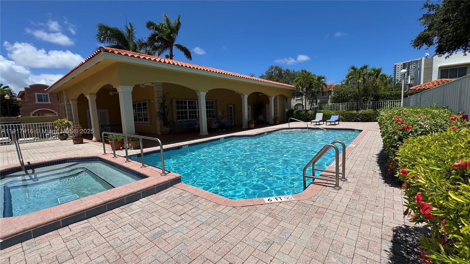 9481 Southwest 78th Avenue Miami, FL 33156 - Photo 43 of 45 a swimming pool with outdoor seating and yard