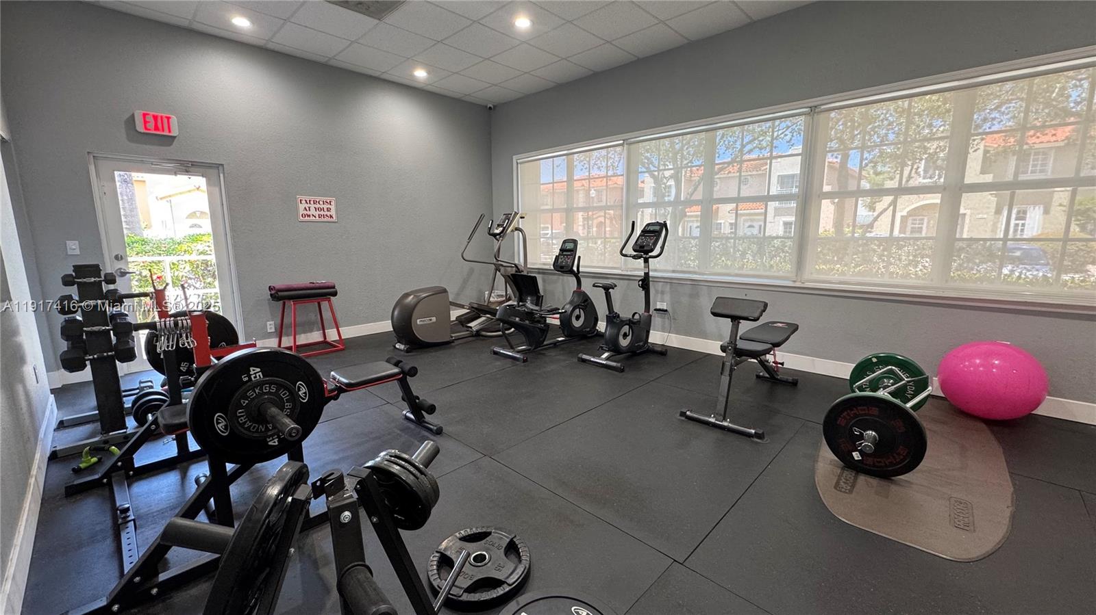 9481 Southwest 78th Avenue Miami, FL 33156 - Photo 45 of 45 a room with gym equipment and a large window