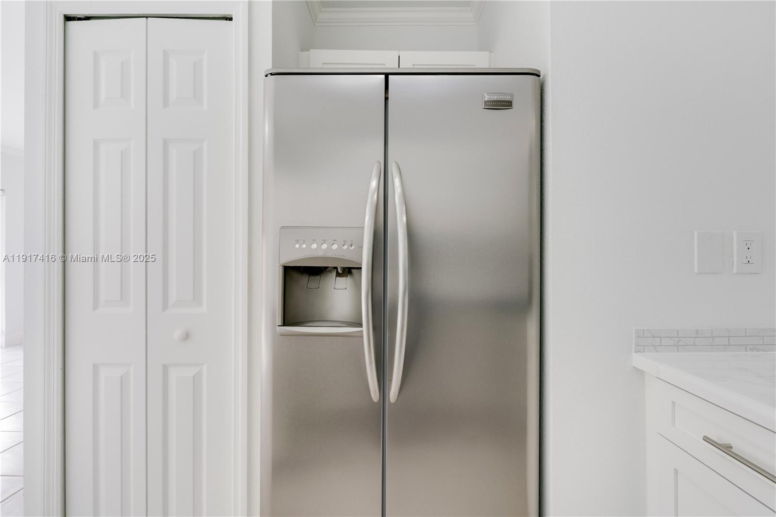 9481 Southwest 78th Avenue Miami, FL 33156 - Photo 9 of 45 a bathroom with a glass shower door