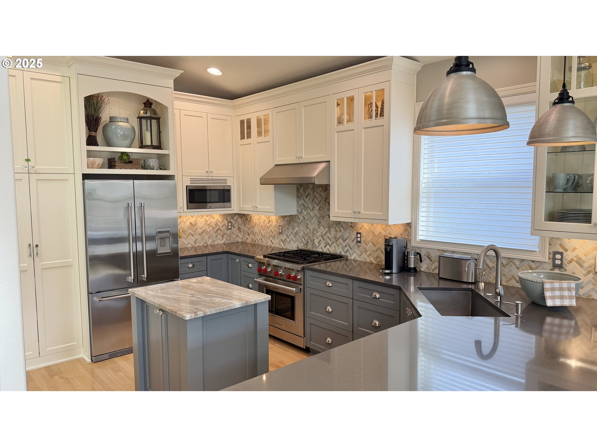 632 Southeast 38th Drive Gresham, OR 97080 - Photo 6 of 46 a kitchen with stainless steel appliances granite countertop a stove a sink and a refrigerator