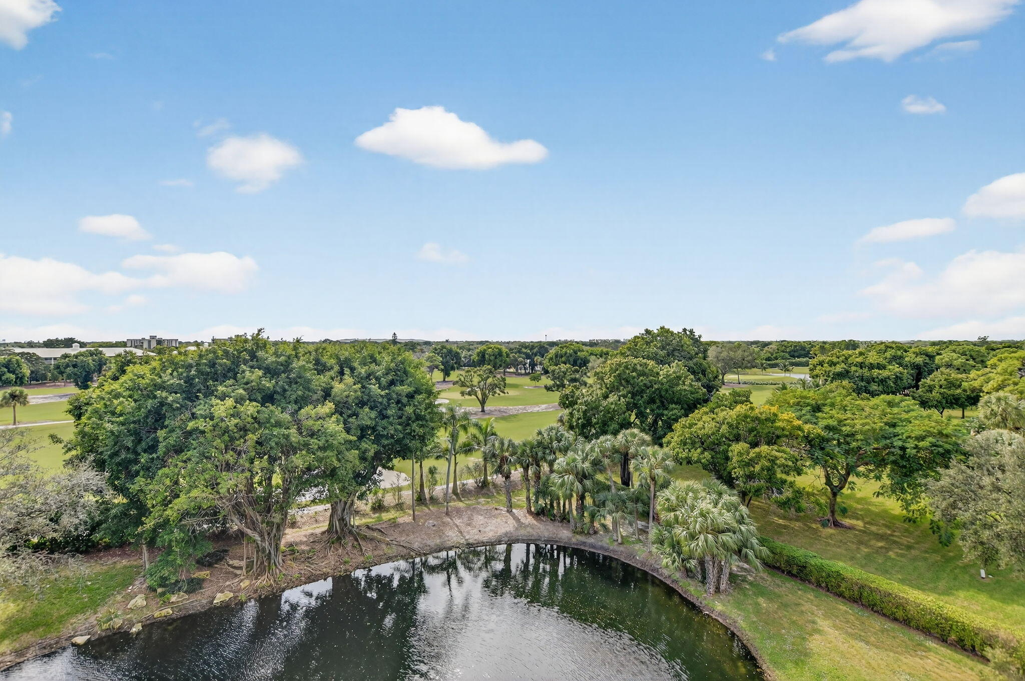 6620 Boca Del Mar Drive, Unit 706 Boca Raton, FL 33433 - Photo 27 of 41 a view of a lake with a city