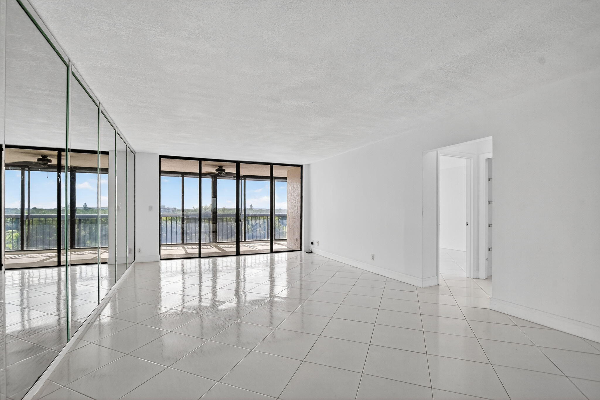 6620 Boca Del Mar Drive, Unit 706 Boca Raton, FL 33433 - Photo 6 of 41 a view of an empty room with a window