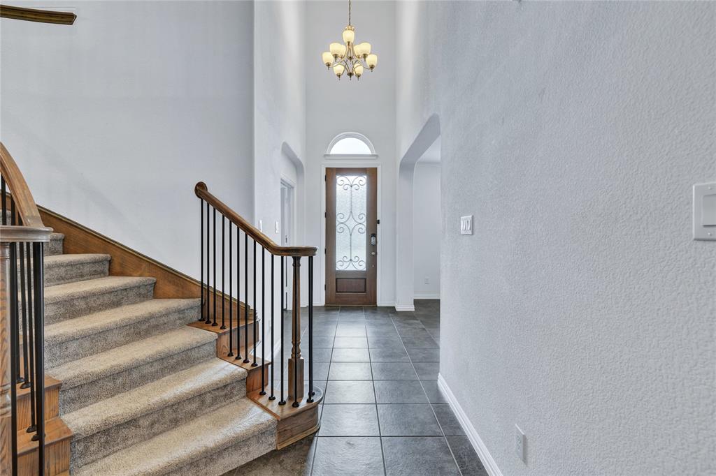 566 Long Meadow Drive Haslet, TX 76052 - Photo 11 of 36 a view of a hallway with entryway
