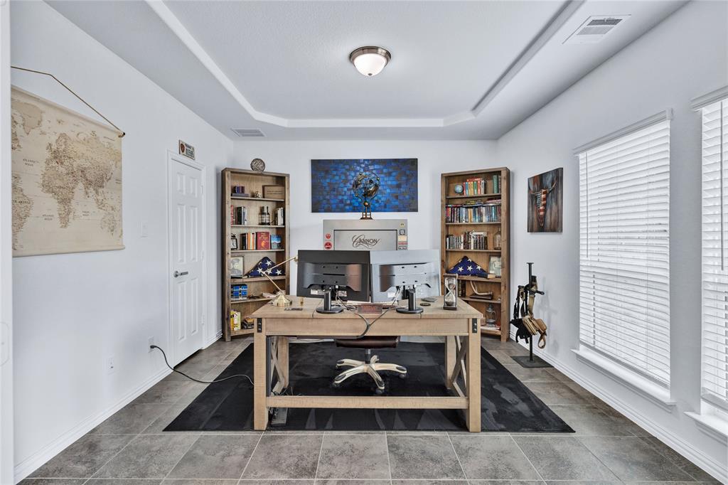566 Long Meadow Drive Haslet, TX 76052 - Photo 13 of 36 a living room with furniture and a fireplace