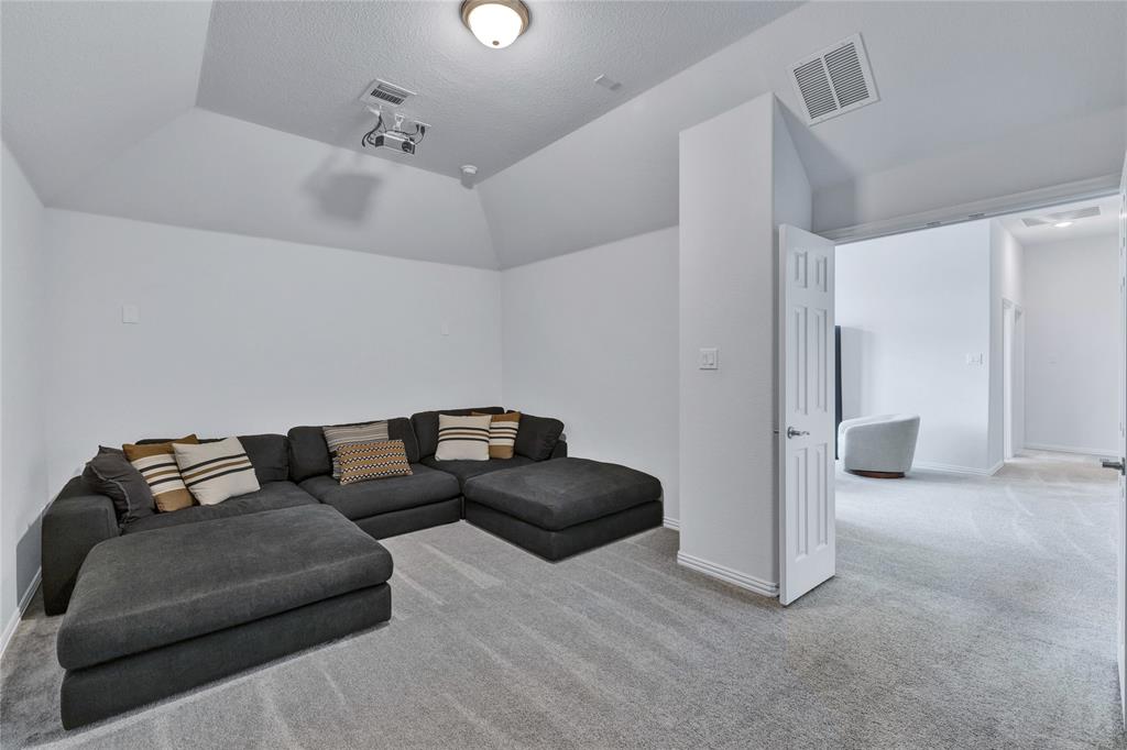 566 Long Meadow Drive Haslet, TX 76052 - Photo 22 of 36 a living room with furniture and a ceiling fan