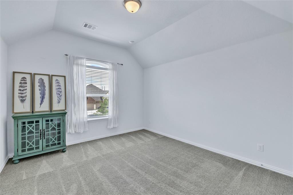 566 Long Meadow Drive Haslet, TX 76052 - Photo 28 of 36 an empty room with windows