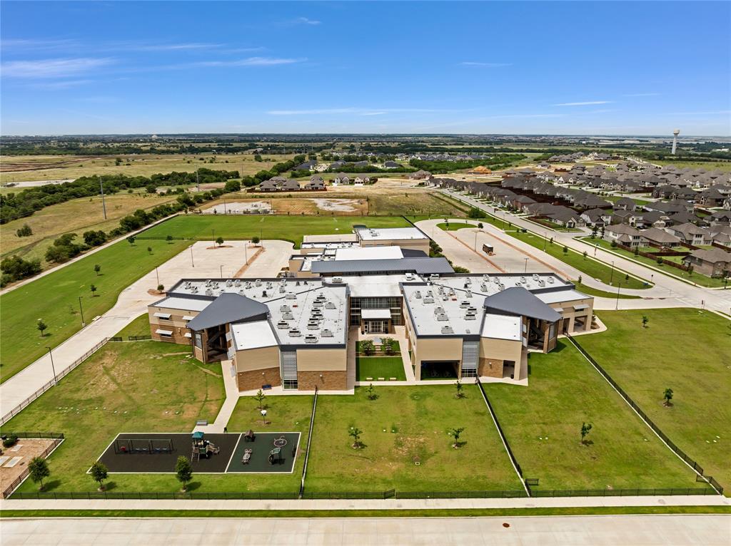 566 Long Meadow Drive Haslet, TX 76052 - Photo 31 of 36 an aerial view of residential houses with outdoor space