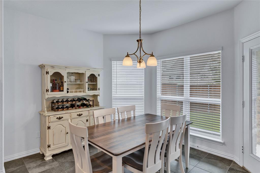 566 Long Meadow Drive Haslet, TX 76052 - Photo 10 of 36 a dining room with furniture and window