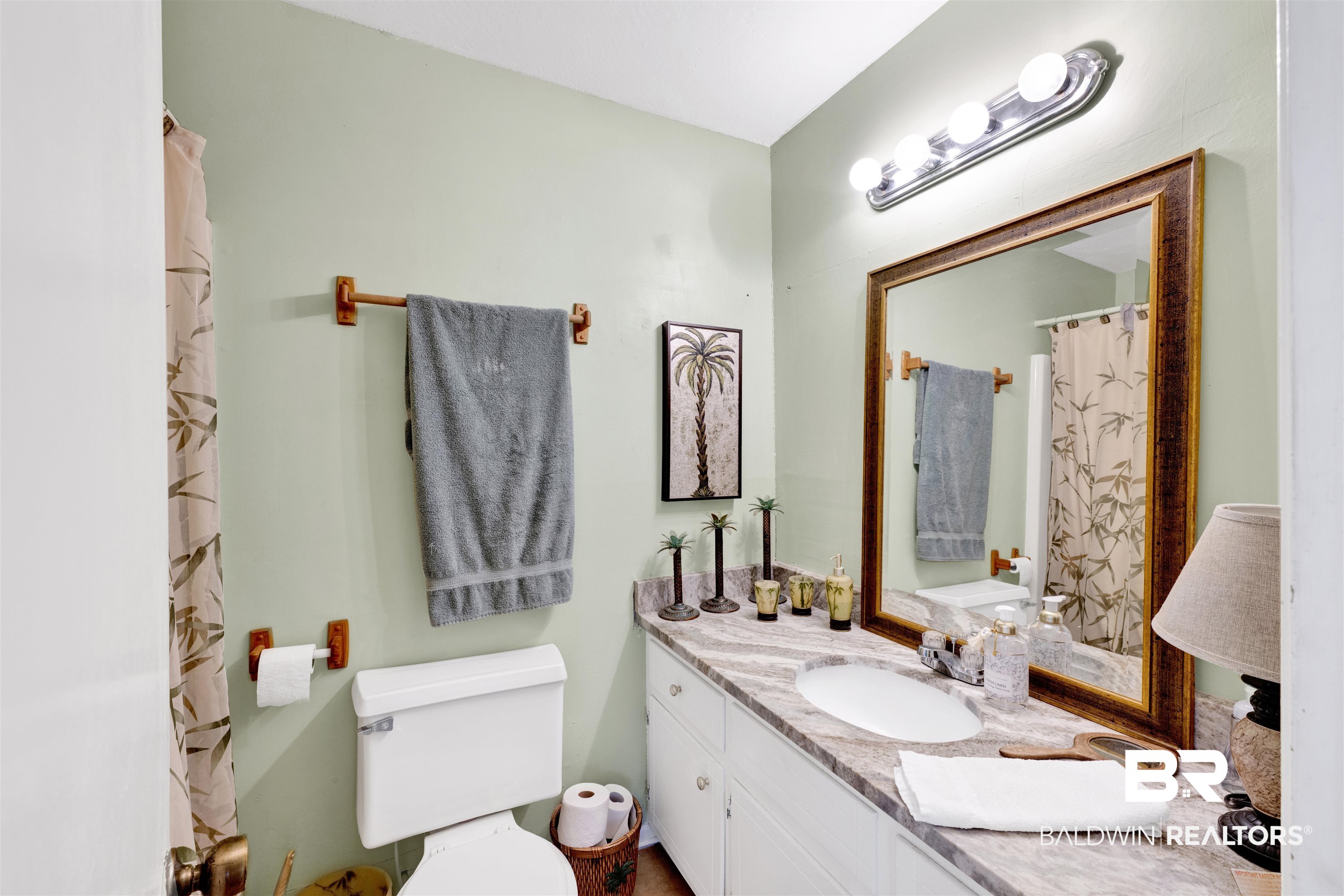 26222 Marina Road Orange Beach, AL 36561 - Photo 23 of 38 Full bath featuring curtained shower and vanity