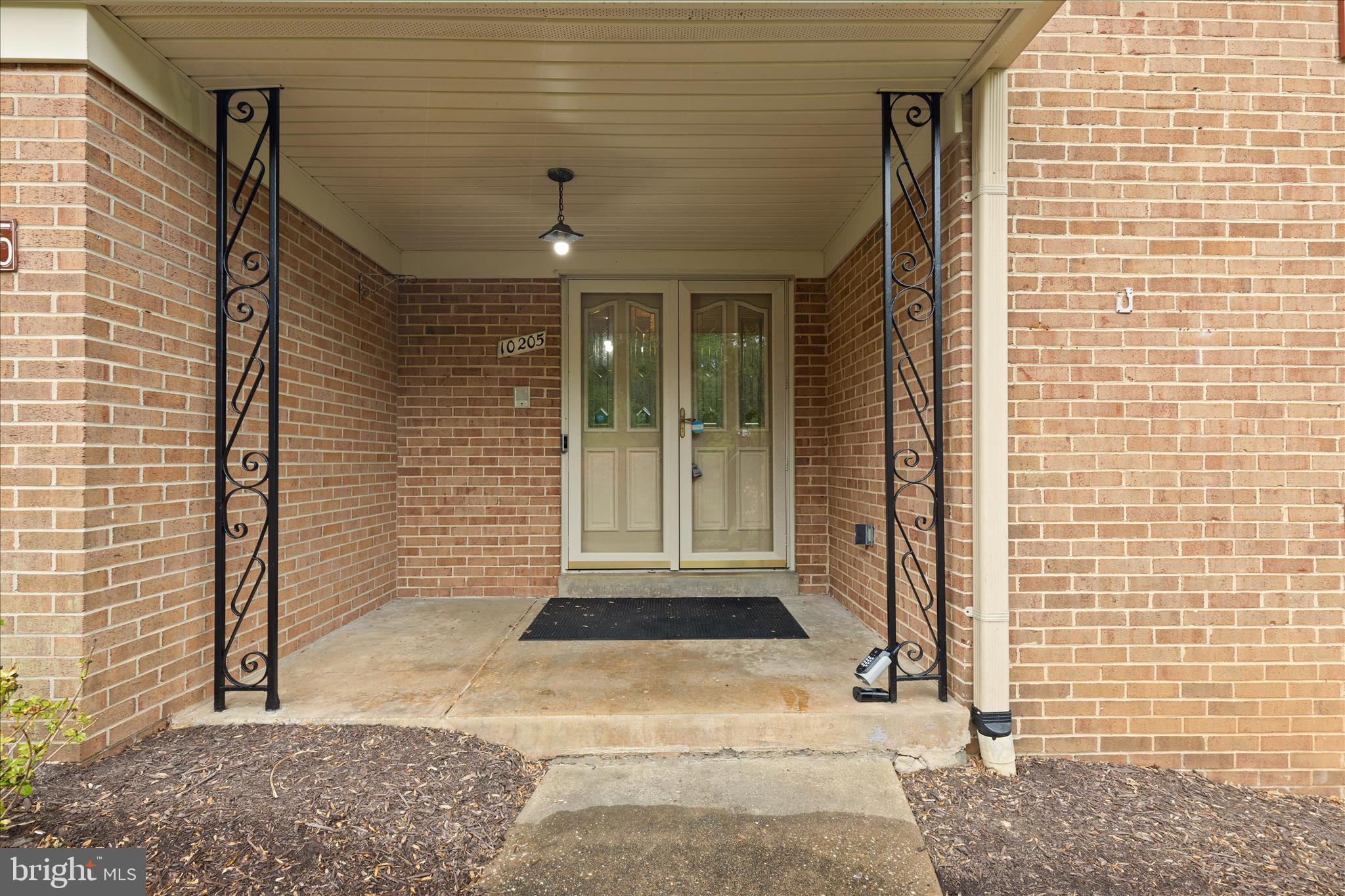 10205 Old Hunt Road Vienna, VA 22181 - Photo 19 of 67 a view of a entryway door front of house