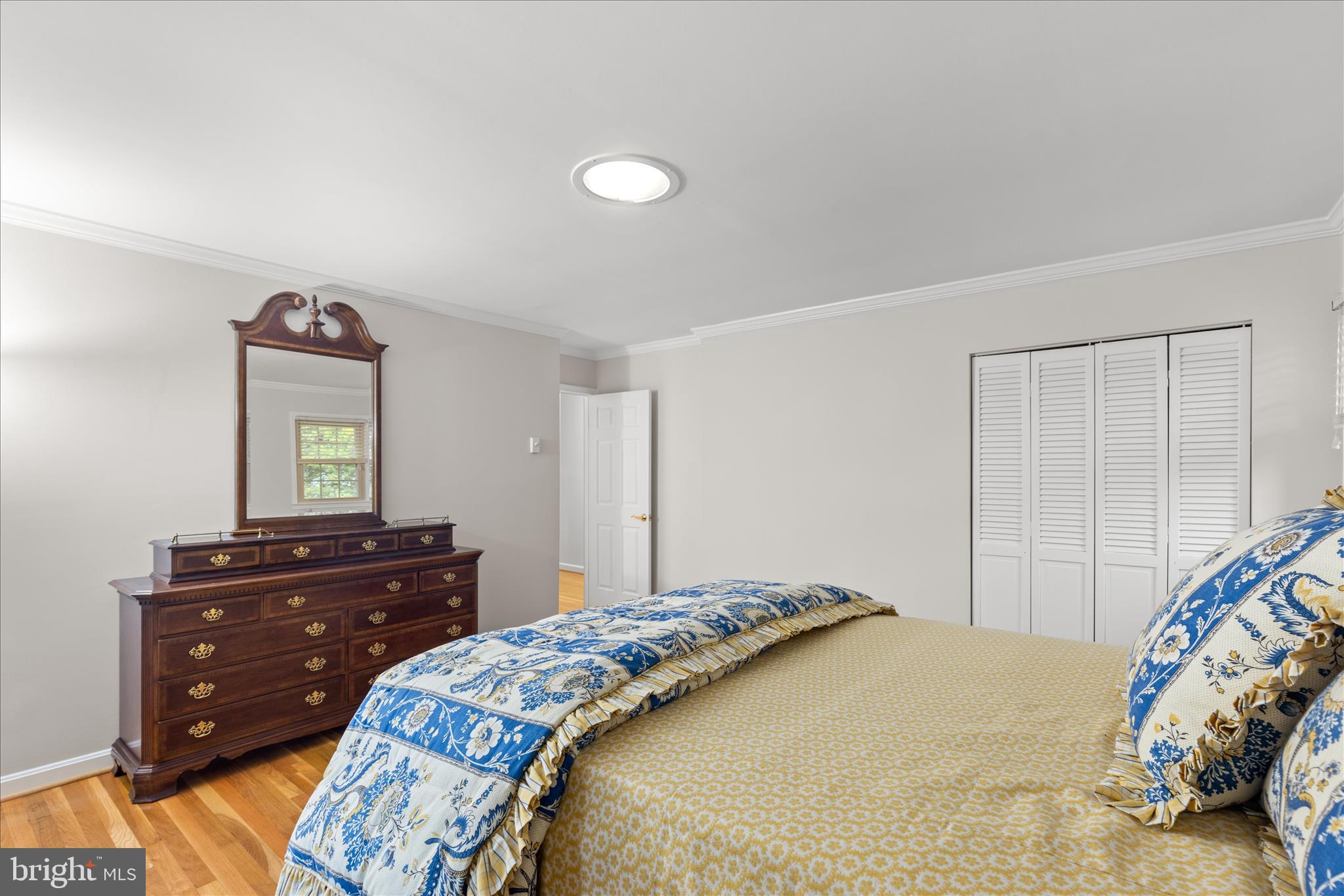 10205 Old Hunt Road Vienna, VA 22181 - Photo 38 of 67 a bedroom with a bed and a dresser