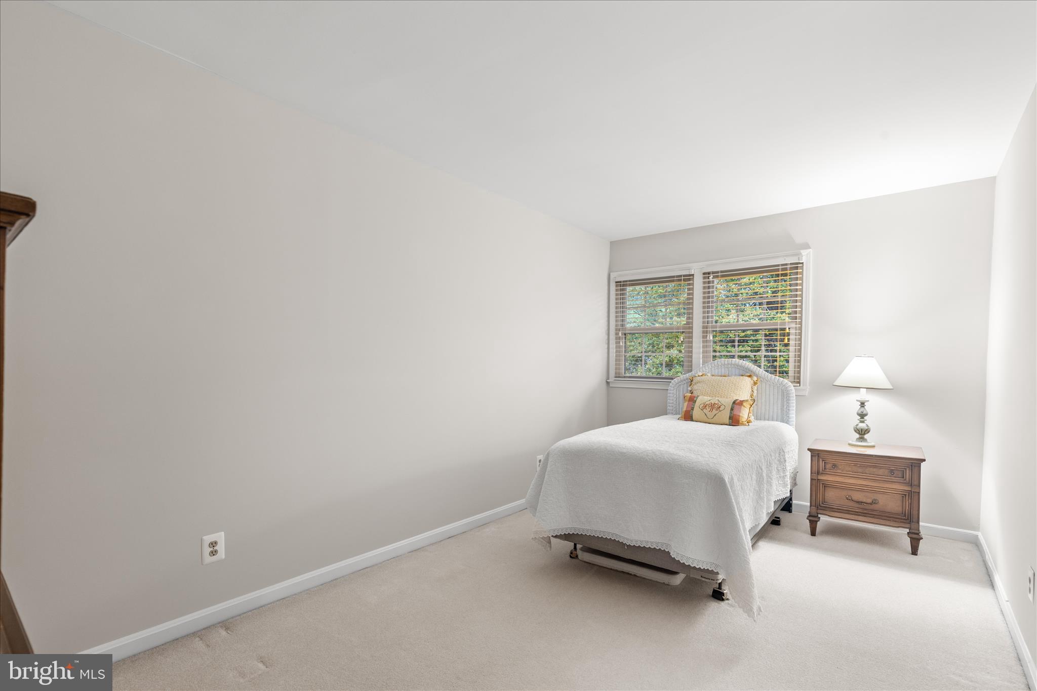 10205 Old Hunt Road Vienna, VA 22181 - Photo 41 of 67 a bedroom with a bed and a window