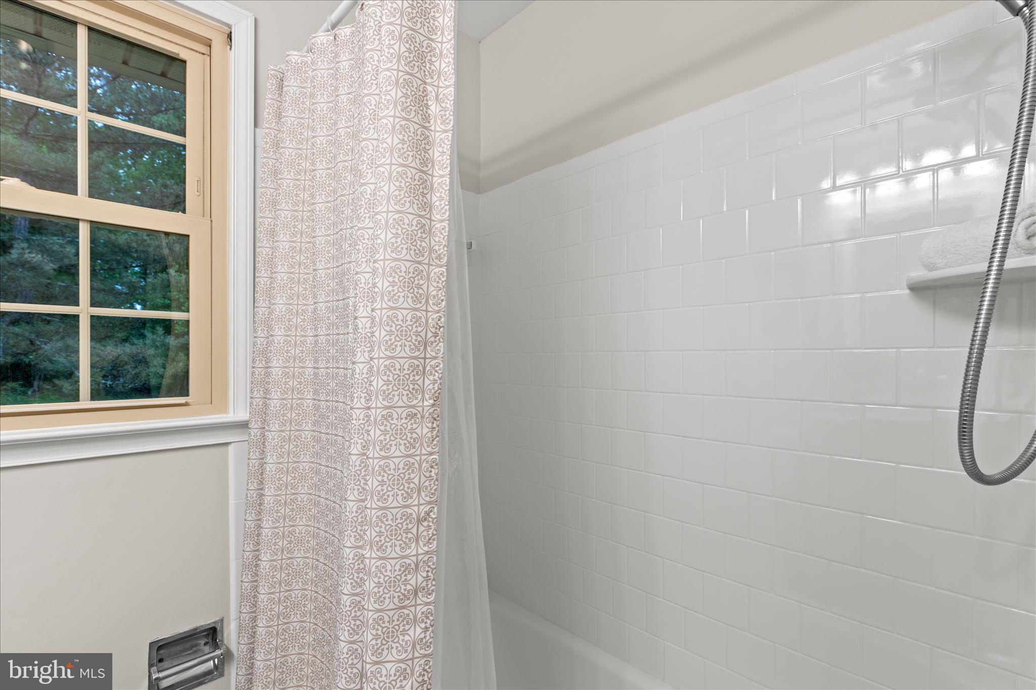 10205 Old Hunt Road Vienna, VA 22181 - Photo 49 of 67 a bathroom with a shower