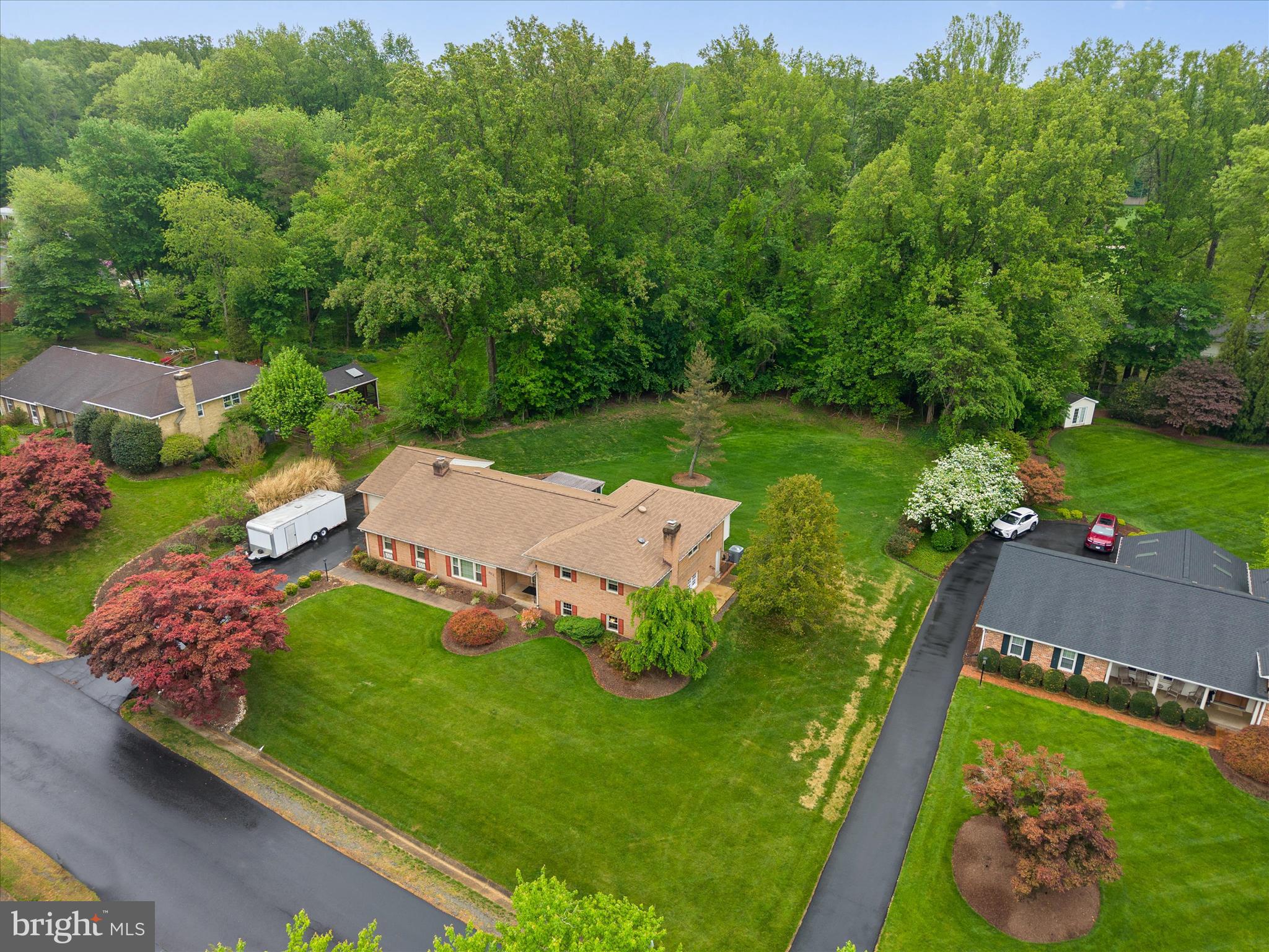 10205 Old Hunt Road Vienna, VA 22181 - Photo 64 of 67 an aerial view of a house with yard swimming pool and outdoor seating