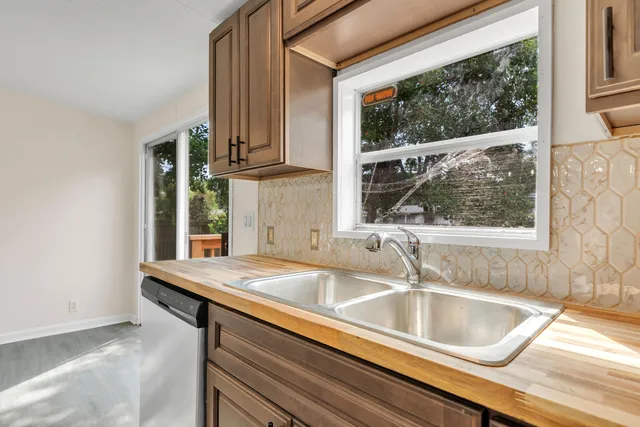 a view of a windows and chandelier in a room