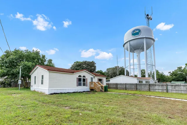 a house view with a garden space