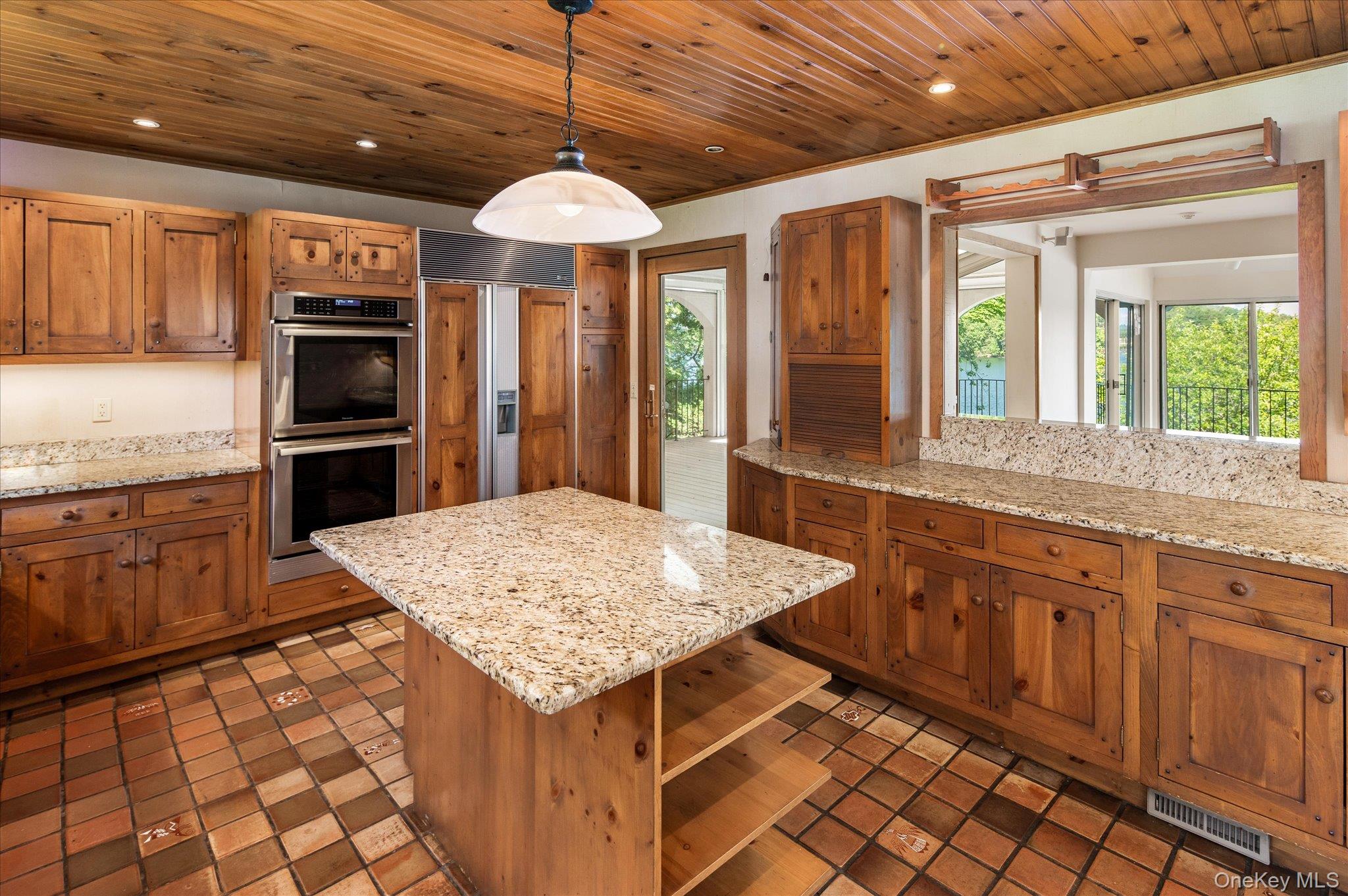 41 Tamarack Road Mahopac, NY 10541 - Photo 24 of 41 The kitchen centers around a generous island where everyone naturally gathers