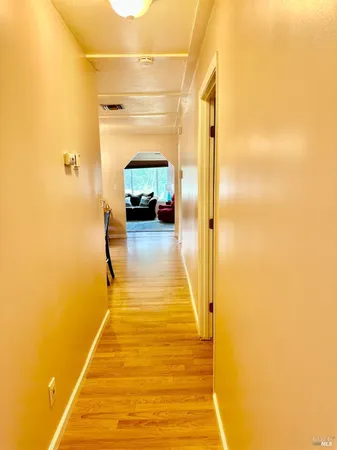 a view of hallway with stairs