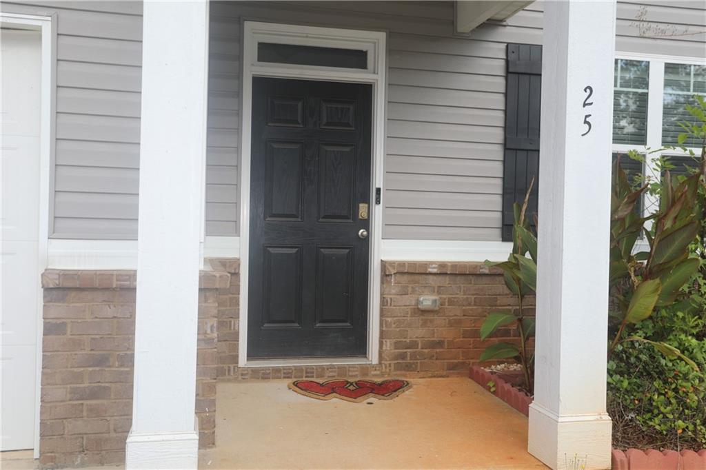 25 Lena Court Covington, GA 30016 - Photo 2 of 36 a bathroom with a shower