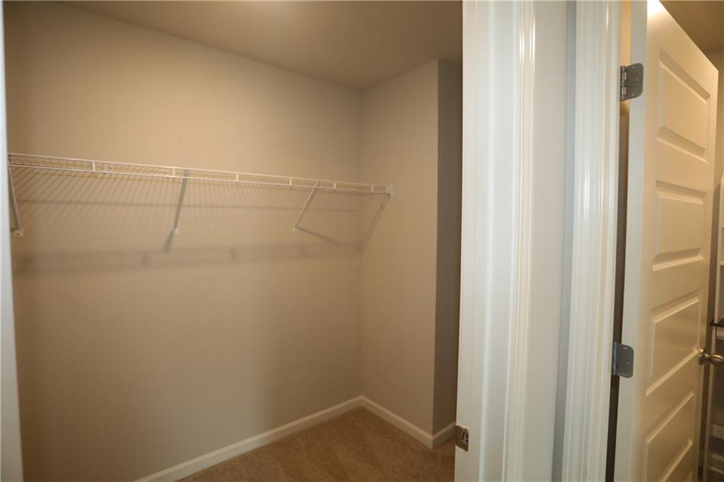 25 Lena Court Covington, GA 30016 - Photo 26 of 36 a bathroom with a shower