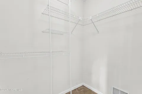 a view of a room with racks on the wall