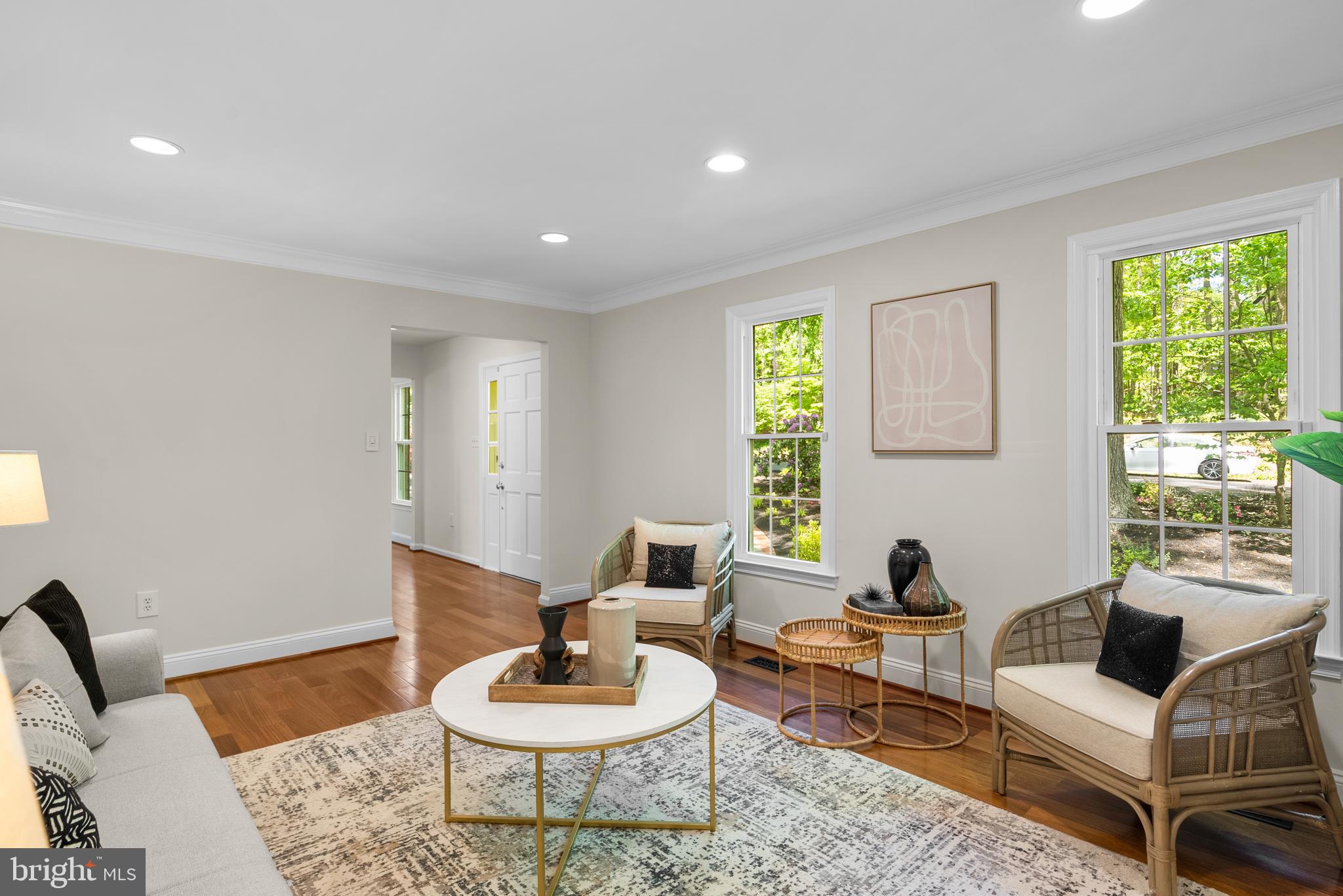 10717 Midsummer Drive Reston, VA 20191 - Photo 9 of 35 a living room with furniture and a wooden floor