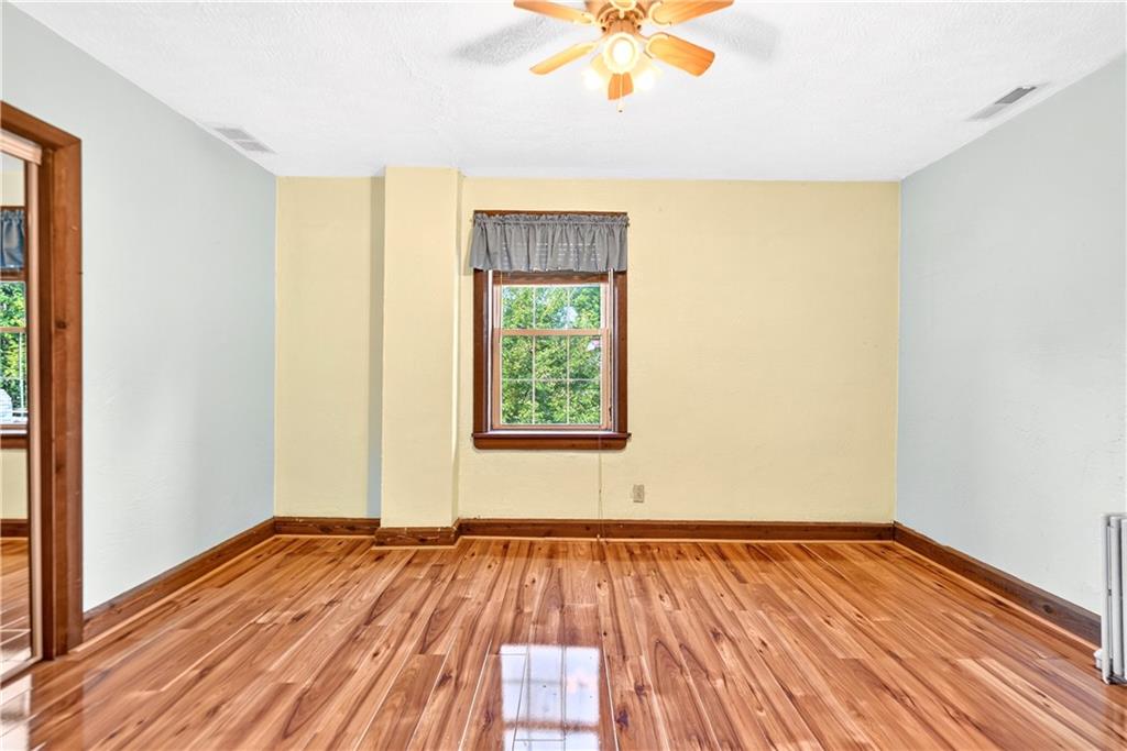 1301 Langeloth Road Burgettstown, PA 15021 - Photo 29 of 50 Bedroom 3 has a fan and stunning hardwood floors...