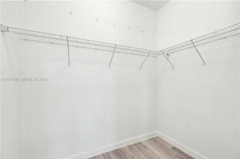 a view of a room with racks on the wall