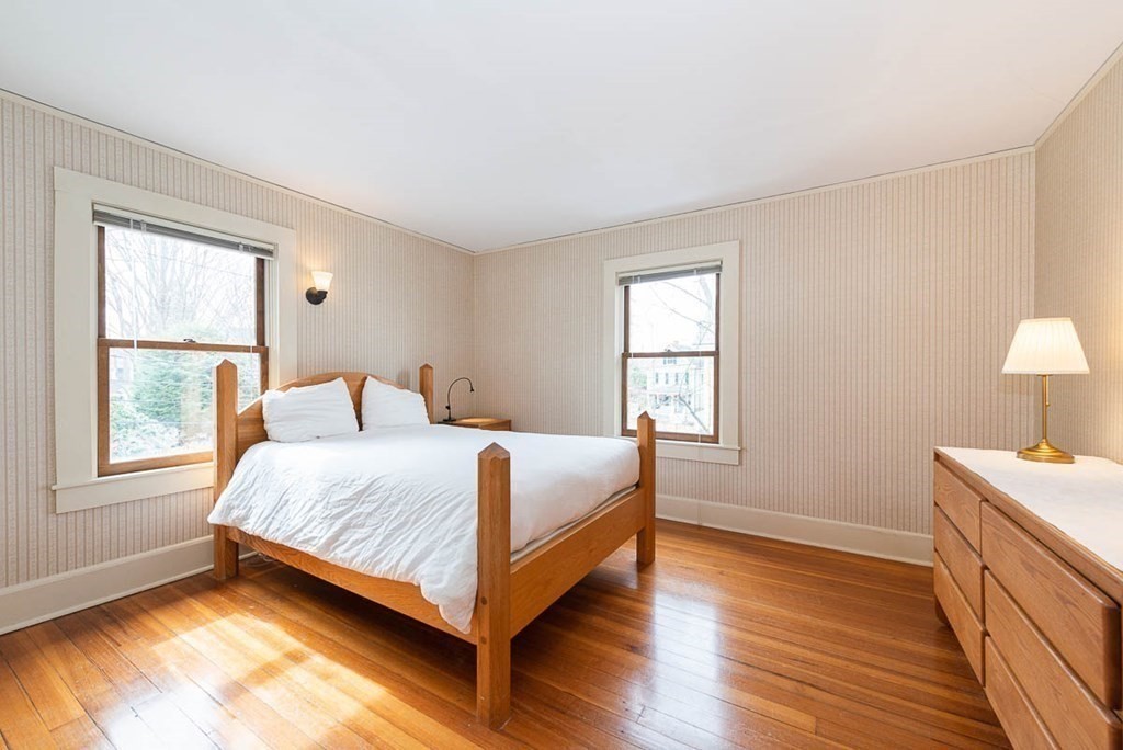 4 Jackson Court Lexington, MA 02421 - Photo 20 of 29 a bedroom with a bed and a window