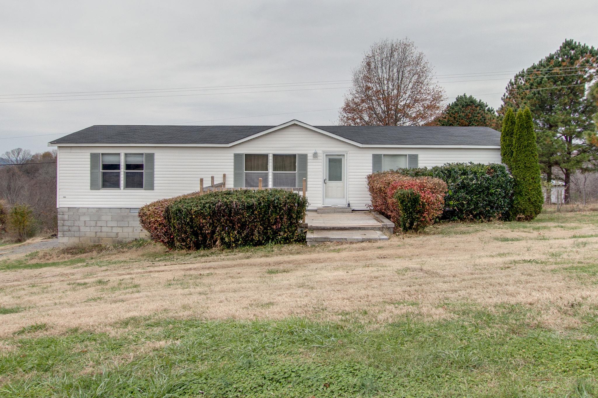 3240 Beasleys Bend Road Lebanon, TN 37087 - Photo 1 of 25 a house with trees in front of it