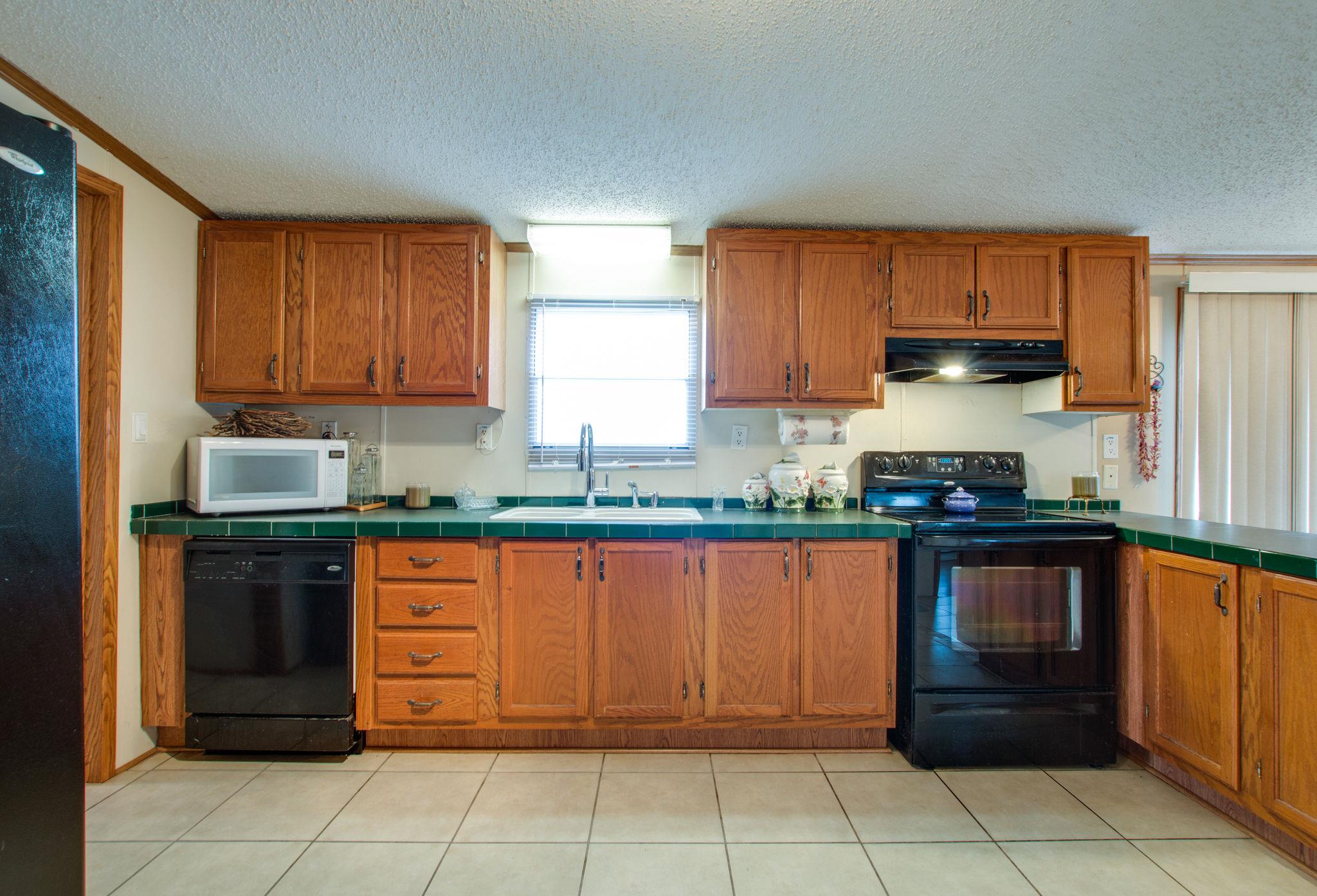 3240 Beasleys Bend Road Lebanon, TN 37087 - Photo 9 of 25 a kitchen with a cabinets and steel stainless steel appliances