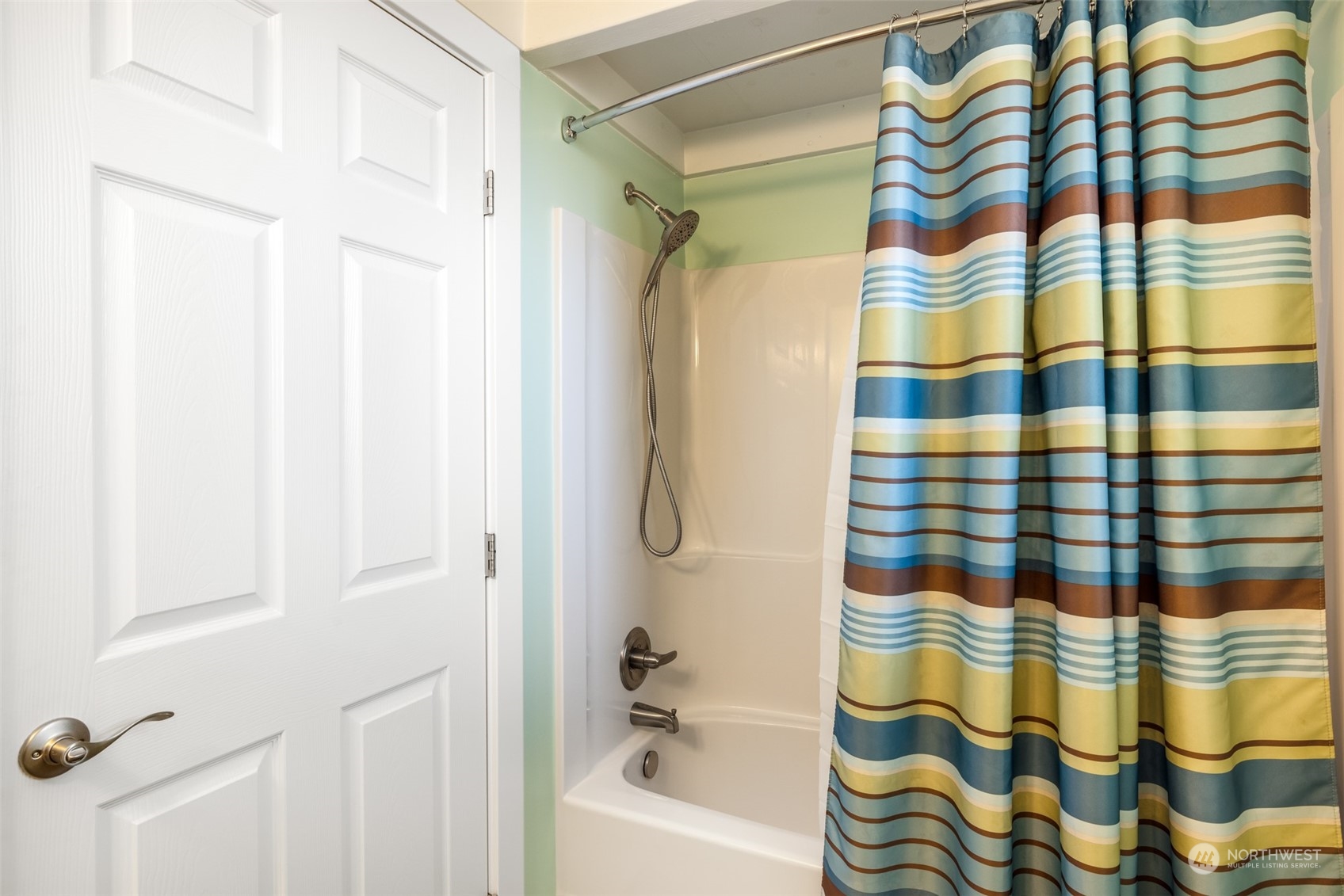 20 Willes Way Port Angeles, WA 98362 - Photo 13 of 34 a bathroom with a shower curtain and a sink