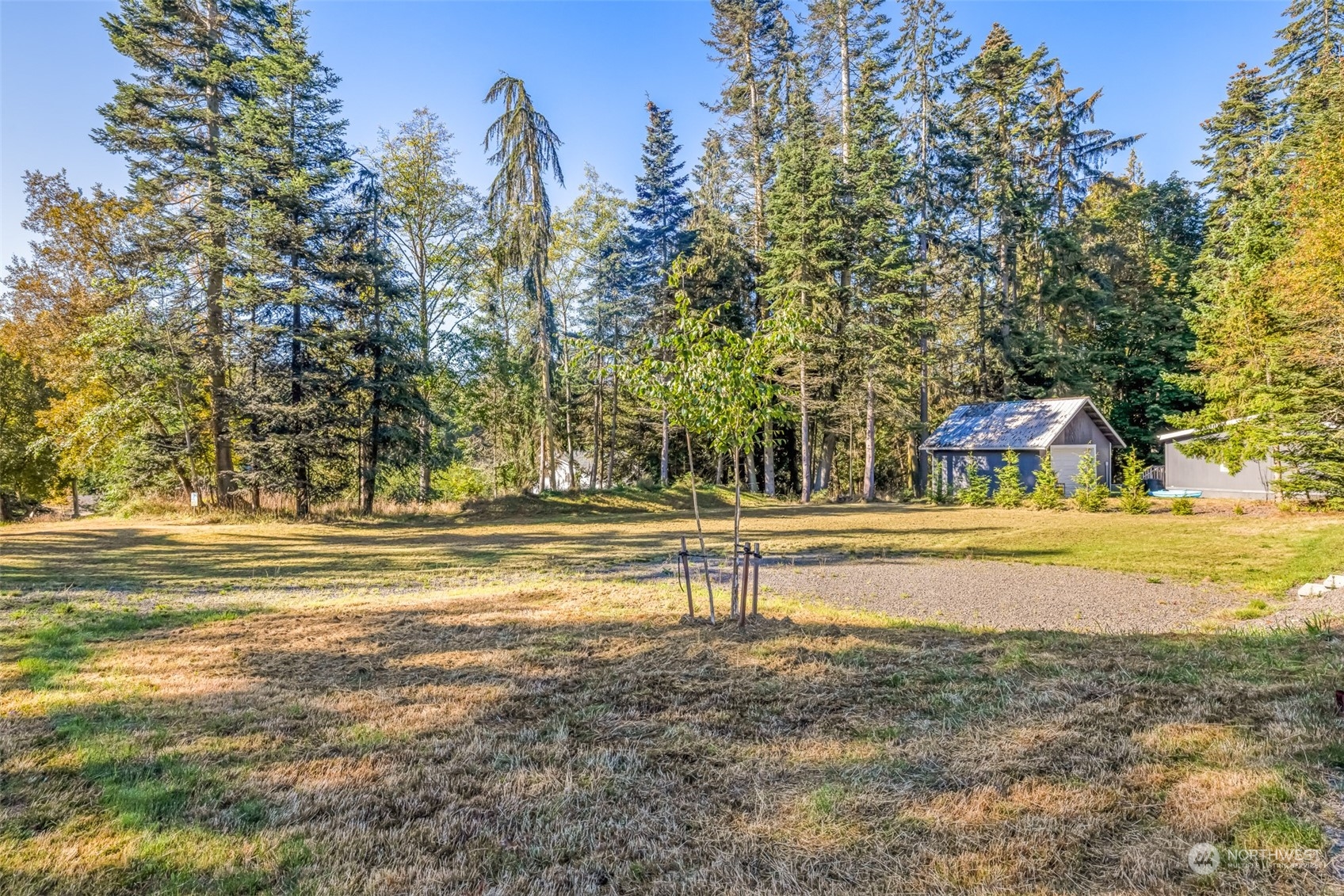 20 Willes Way Port Angeles, WA 98362 - Photo 23 of 34 a view of a swimming pool with an outdoor space and seating area