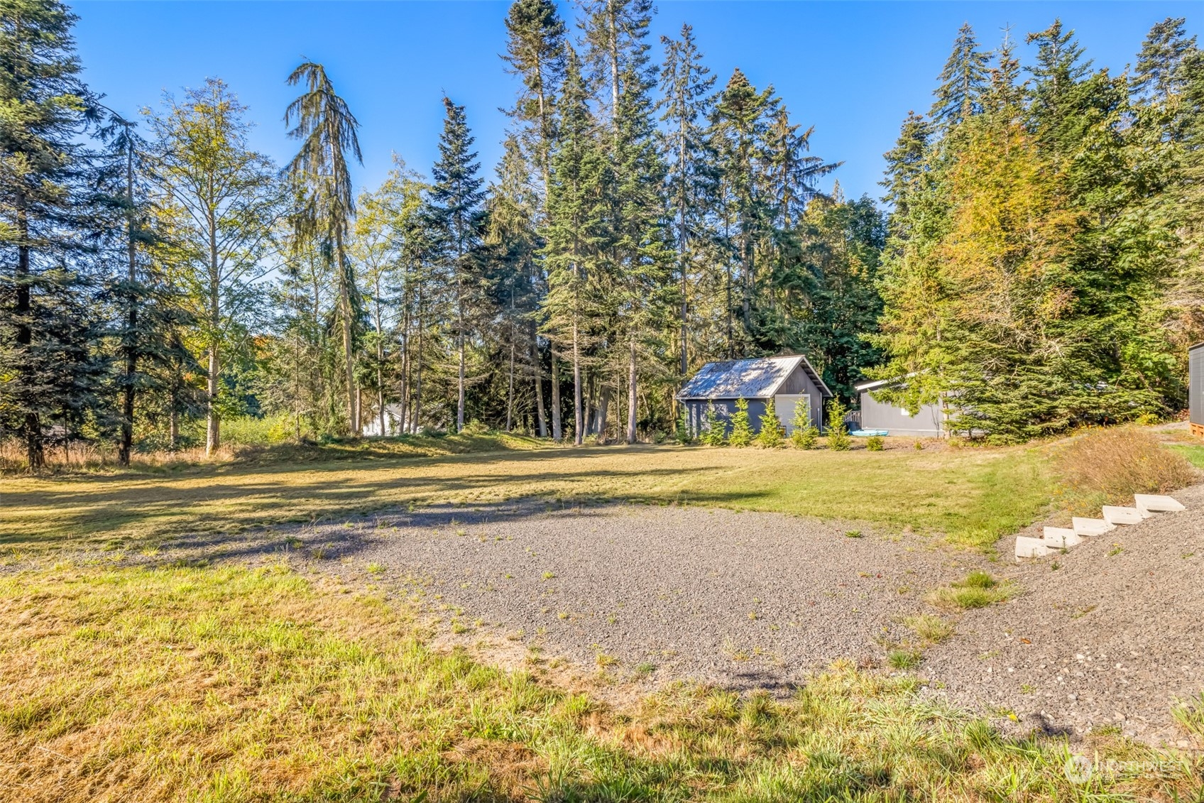 20 Willes Way Port Angeles, WA 98362 - Photo 24 of 34 a view of a swimming pool with an outdoor space and seating area