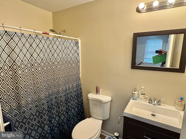 a bathroom with a sink and a toilet
