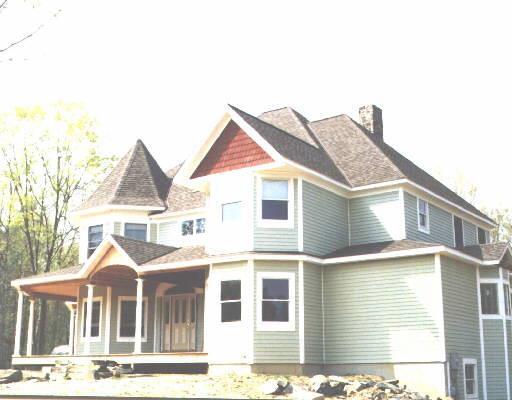 Kendra Court Ridgefield, CT 06877 - Photo 1 of 1 a front view of a house with a yard