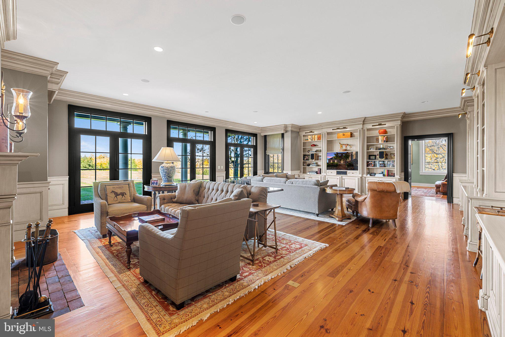 1077 Ginns Road Boyce, VA 22620 - Photo 15 of 140 a living room with furniture and a wooden floor